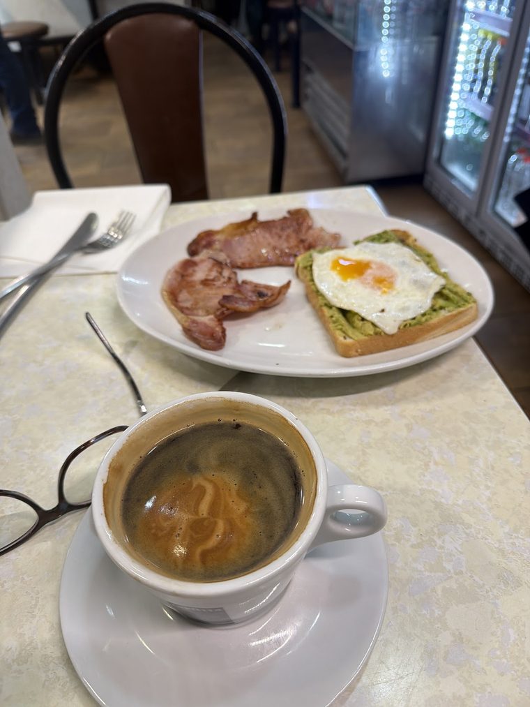 Avocado on toast with poached egg and bacon